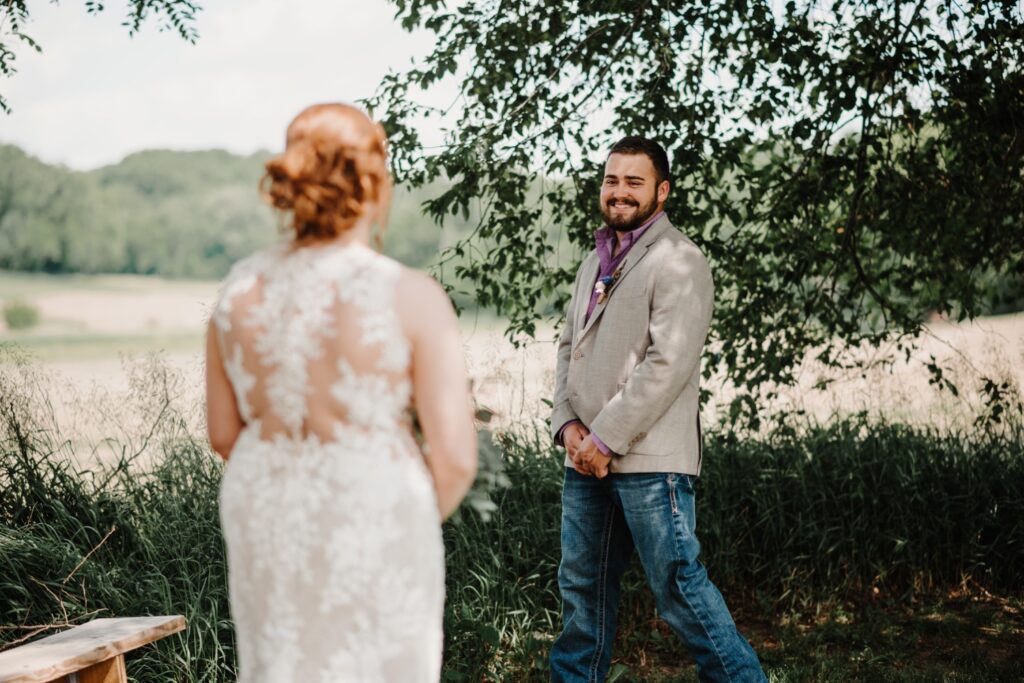Bride and groom share first look at Reichert's Barn wedding