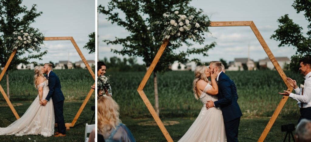 Bride and groom first kiss at Destihl Brewery Wedding
