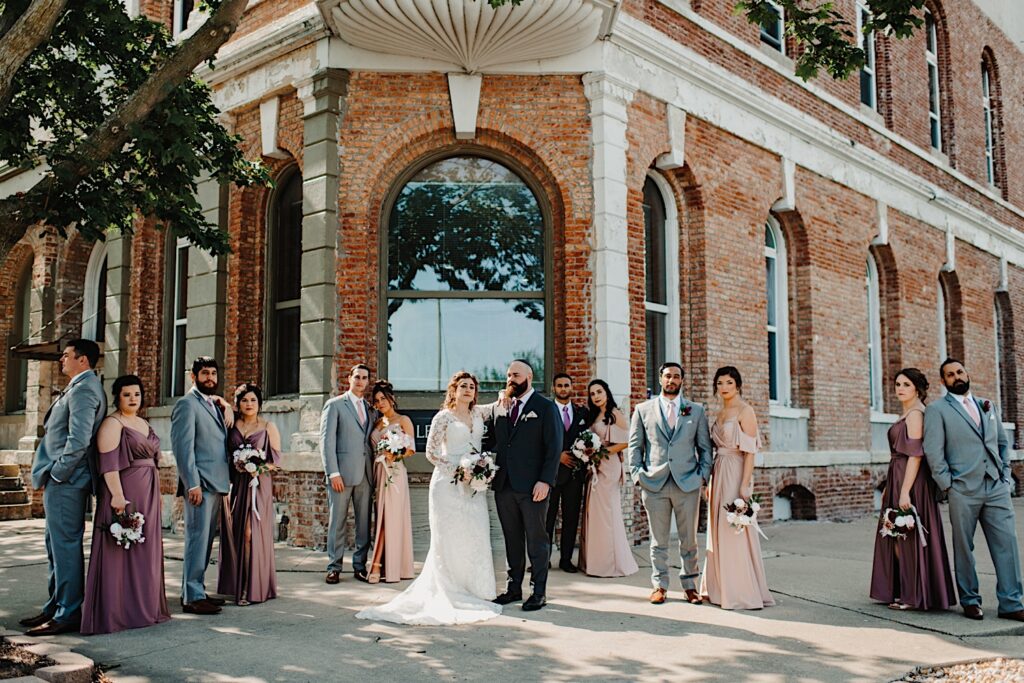 Wedding party in front of the Legacy Building