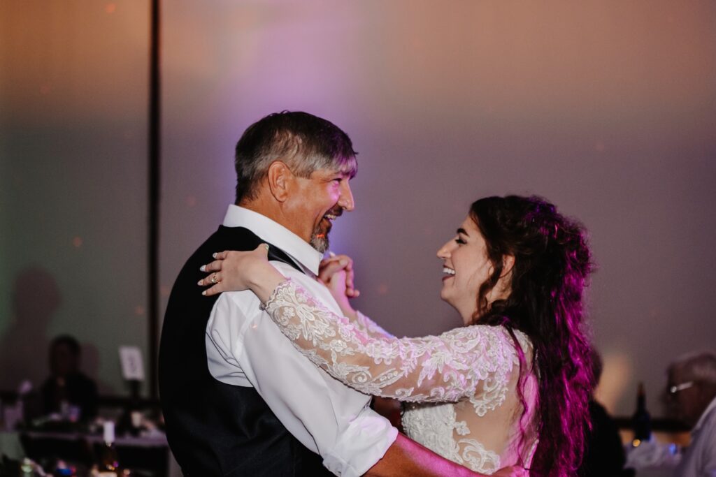 Bride dances with father at Legacy Building wedding reception
