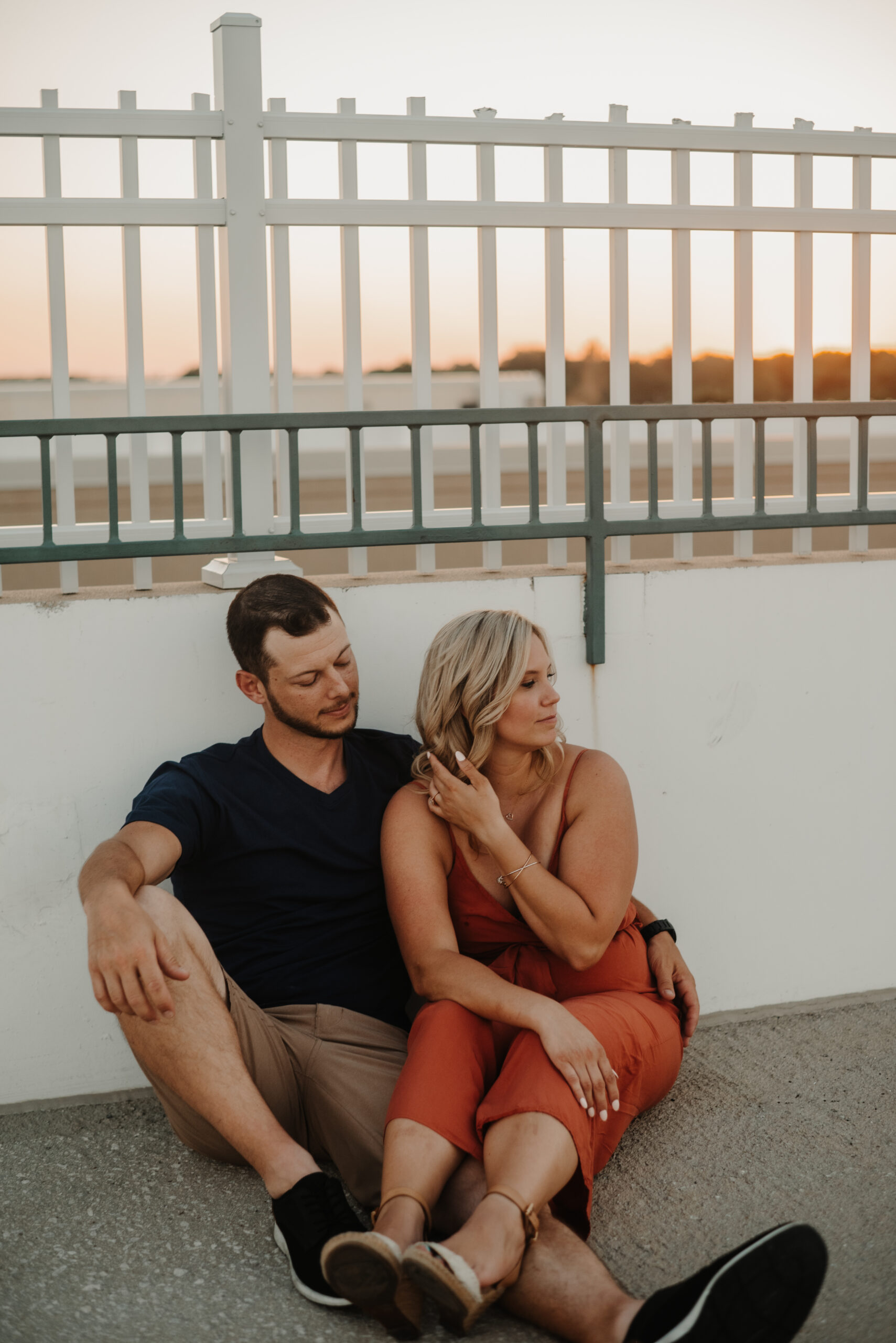 sunset top of parking deck couple engagement session