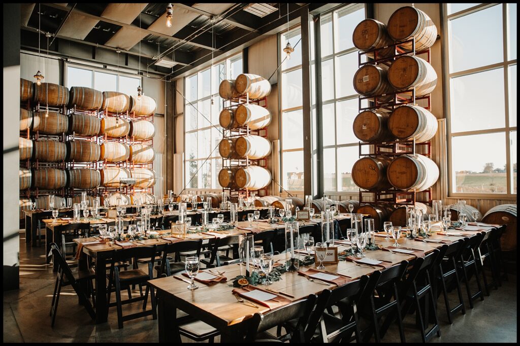 Unique wedding venues in central il - the barrel room offers large windows and a modern touch to it's rustic chic charm